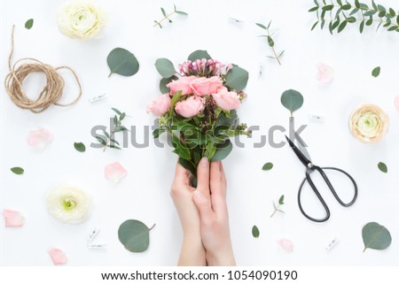 Similar – Foto Bild Florale Komposition auf Kraftpapier mit Frühlingsblumen