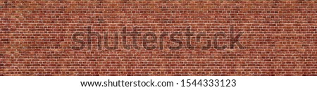 Old red brick wall background, wide panorama of masonry 商業照片 © 