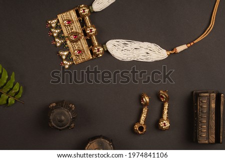 Indian Style Good and Stone Base Jewellery with Light and Dark Background 商業照片 © 