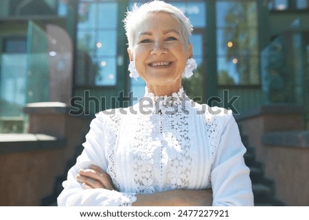 Similar – Image, Stock Photo Bossy elegant woman against vintage interior in country house