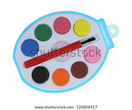A toy paint set with round cakes colors, brush, water hole center.
