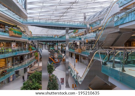 AMSTERDAM, THE NETHERLANDS - MAY 23: People shopping in the Dutch indoor shopping mall Villa Arena on May 23, 2014 in Amsterdam, the Netherlands