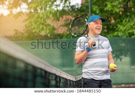 Similar – Image, Stock Photo Senior man playing tennis in gym