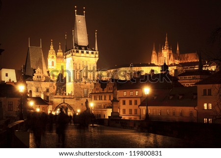 The night View on Prague Lesser Town with St. Nicholas' Cathedral, Bridge Tower and gothic Castle, Czech Republic
