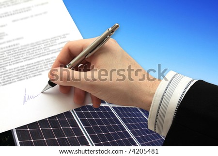 The Signature of Business Contract in front of the Solar Power Station