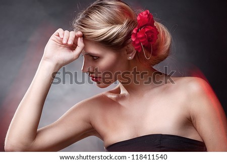 Portrait of luxury woman in exclusive jewelry on natural background
