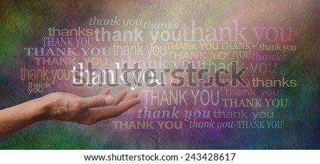 Thank you SO much - woman's hand facing palm up with the word 'thank you' floating above surrounded by many different sized thank yous on a stone effect multicolored wide background