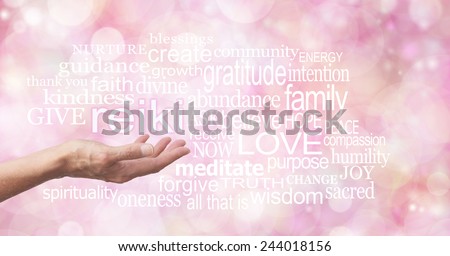 Reiki in the palm of your hand  -  Female hand outstretched with the word REIKI floating above, surrounded by healing related words on a wide pink bokeh background