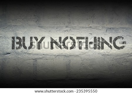 buy nothing stencil print on the grunge white brick wall