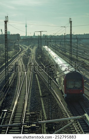 train moving by complicated railway system in Berlin