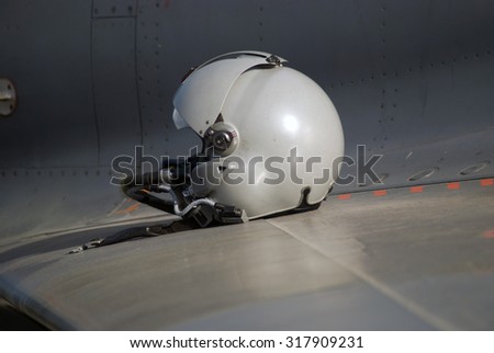 Pilots helmet on the wing