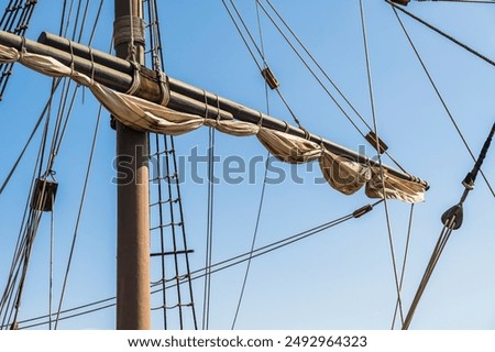 Similar – Foto Bild Strickleiter gegen blauen Himmel und Wolken