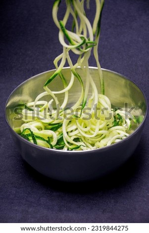 Similar – Foto Bild Hausgemachte Zucchini-Spaghetti mit Pestosauce, Brokkoli und Kirschtomaten