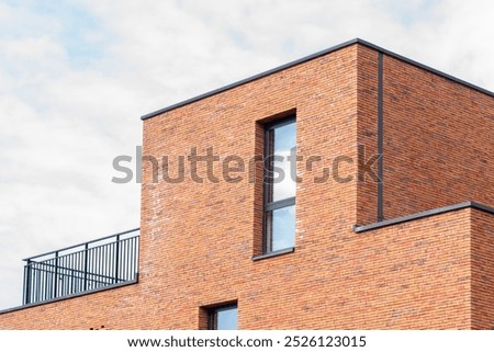 Similar – Foto Bild Fassade aus Backsteinbau und blühenden Bäumen