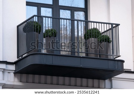 Similar – Image, Stock Photo Minimalist balcony door with shiny knob