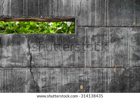 the grunge concrete wall in the city with a void. Close up
