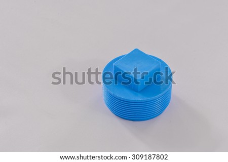 PVC ball valve and pipe on white background.