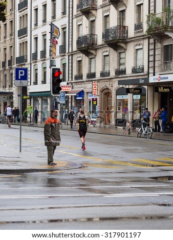 29 July 2015. harmony marathon in geneva. switzerland,protection of the road for a marathon by outsiders