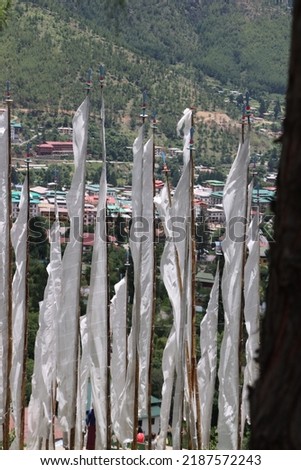 Prayer flags are a common sight throughout Bhutan. For hundreds of years, prayer flags have played a major role in the traditions of the Bhutanese people. Bhutan’s prayer flags, like Tibetian prayer f Stock fotó © 