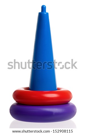 Pyramid build from colorful plastic rings, isolated on white background.