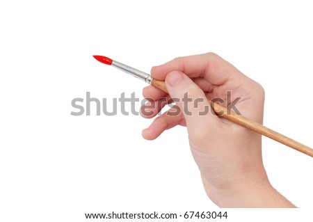 Female hand holding paint brush isolated over white background