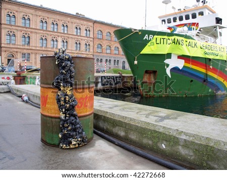COPENHAGEN DEC 5 Oil drum is shown in front of the Greenpeace ship Arctic Sunrise which is docked in the harbour during the UN Conference on Climate Change.