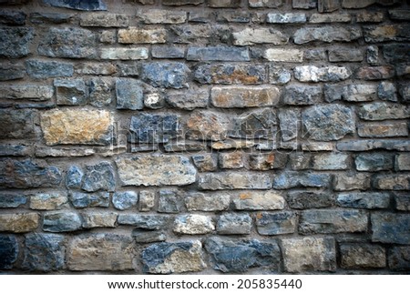 Dark and old stone wall