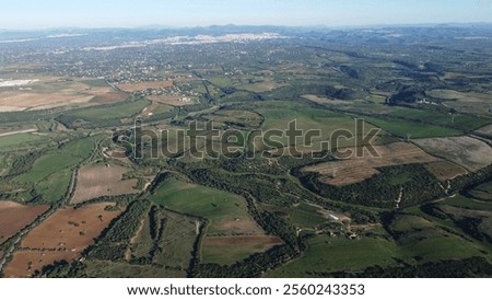 Similar – Foto Bild Luftaufnahme einer ländlichen Landschaft. Mähdrescher arbeitet im Feld, sammelt Samen. Ernte von Weizen im Spätsommer. Landwirtschaftliche Maschine Sammeln Golden Ripe. Vogelperspektive Drohne Ansicht