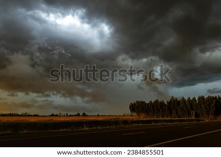 Similar – Image, Stock Photo Dramatic sunset over a pristine landscape with an approaching storm from the north over part of Beskydy mountains, czech republic