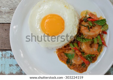 rice with shrimp curry and sunny side up fried egg