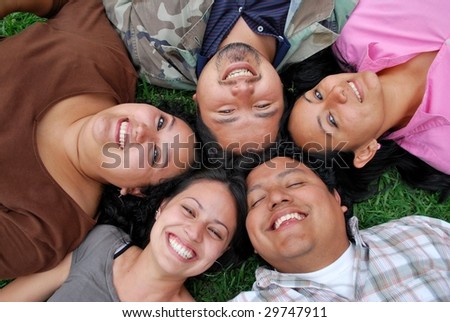 faces of happy Hispanic friends