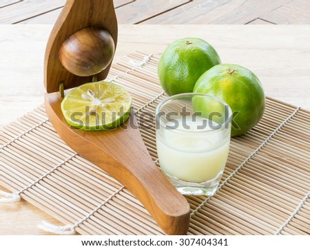Lemonade, Lemon Squeezer on wood background