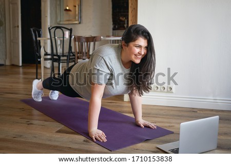 Similar – Foto Bild Sportliche Frau beim Training an der Uferböschung