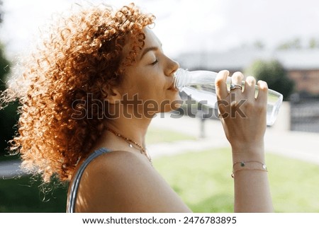 Similar – Image, Stock Photo Traveling woman drinking water from river