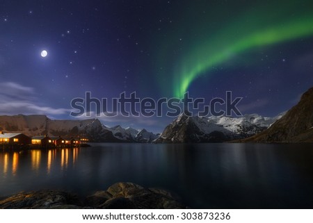 Moon Sonata.\
Aurora Borealis and the Moon over the village of Hamnoy in Lofoten, Norway.