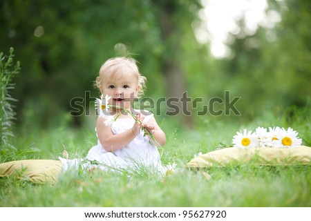 Similar – Image, Stock Photo Happy baby outdoors, toddler walks in the summer garden