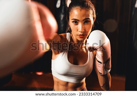 Similar – Image, Stock Photo Female boxer punching camera