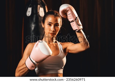 Similar – Image, Stock Photo Female boxer punching camera