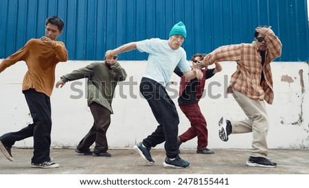 Similar – Image, Stock Photo Stylish dancer dancing in corner of studio