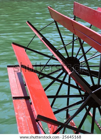 Paddle wheel from the foot of Jarvis at the Toronto waterfront. An old but renovated ferry docked in a rather unsettling liquid. Yes that\'s what the water looks like here on a hot and humid day.