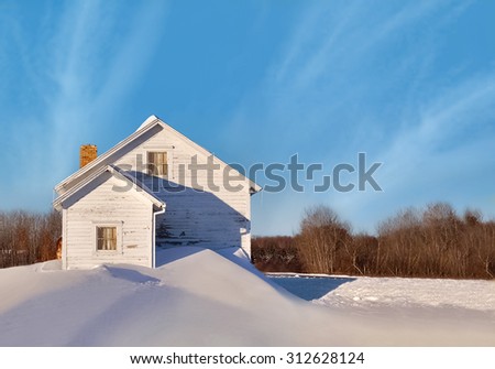 Abandoned house in drifting snow. Blue Hill Township, Minnesota.