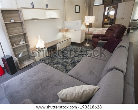 Sofa and TV wall cabinet in living room furniture show home