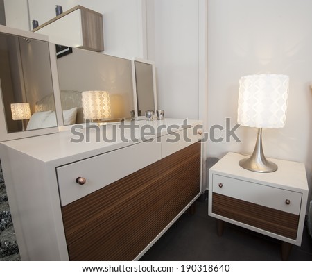 Bedroom dressing table and mirror in furniture shop show room