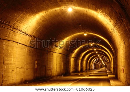 Long concrete tunnel though a mountain