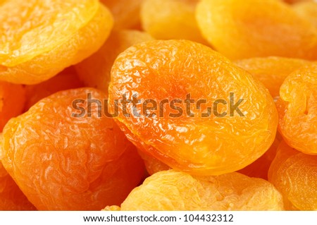 Heap of dried apricots close-up.