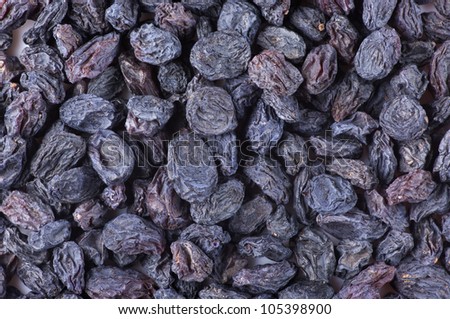 Close-up of dark raisins (currant). Top view point.