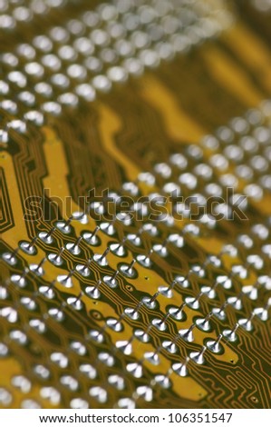 Computer part: contacts of circuit board close-up.