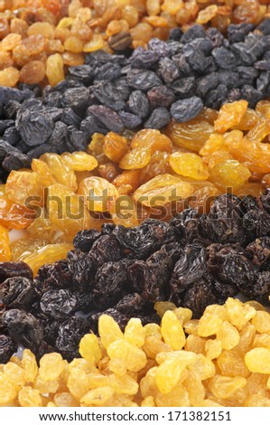 Heap of assorted raisins close-up.