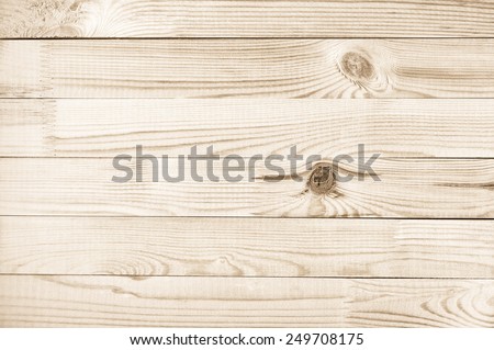 Natural knotted pine wood plank texture background.