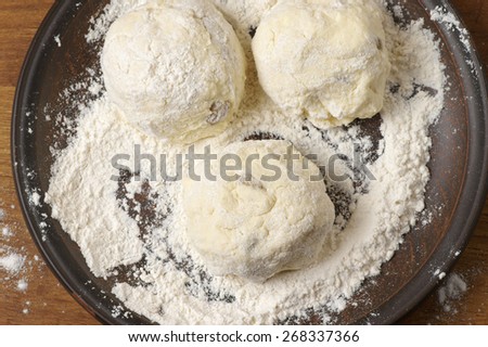 Cooking: dough balls for cottage cheese pancakes.
